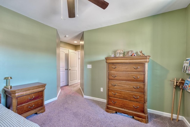 bedroom featuring ceiling fan and light colored carpet