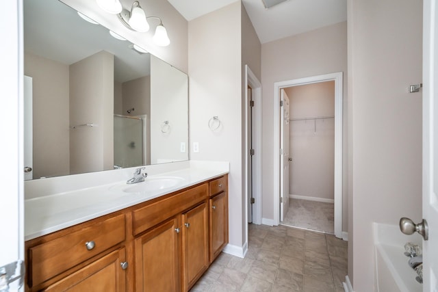 bathroom with independent shower and bath and vanity