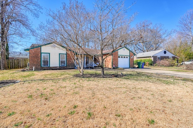 ranch-style house with a front lawn and a garage