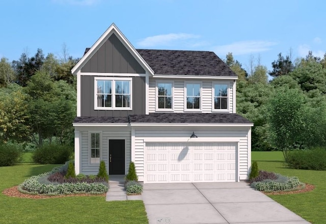 view of front of home featuring a front yard and a garage