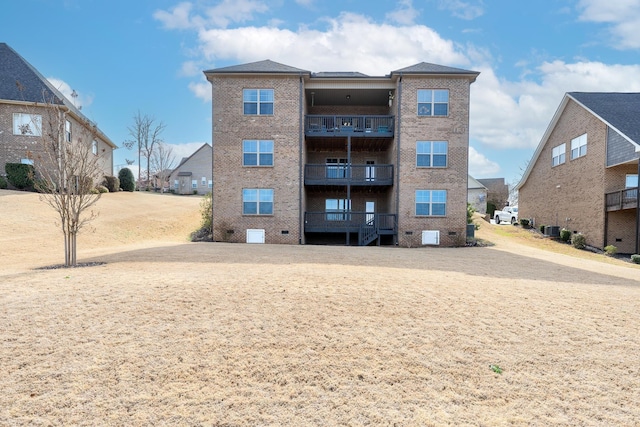 view of property featuring central AC unit