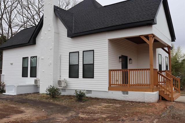 view of front facade with ac unit