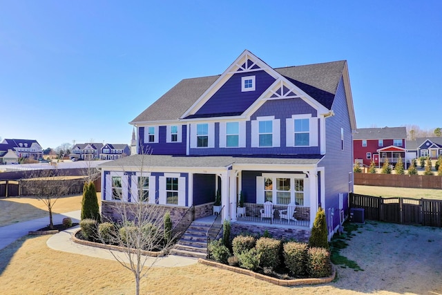 view of front of property with central AC unit and a porch