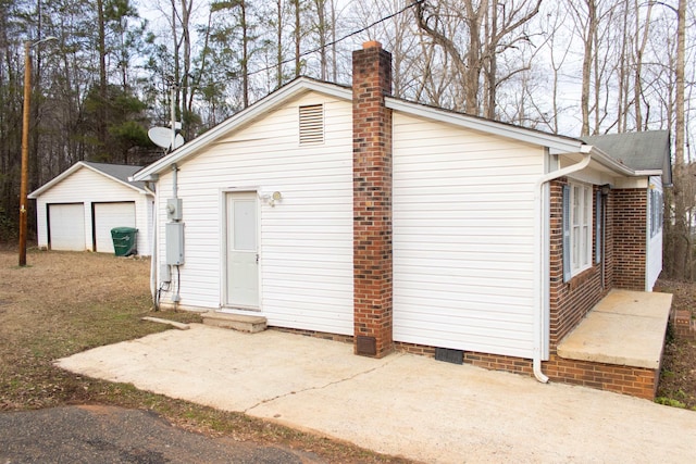 view of outbuilding with a garage