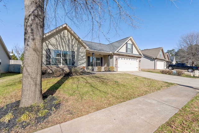 ranch-style house featuring a front lawn, a porch, and a garage