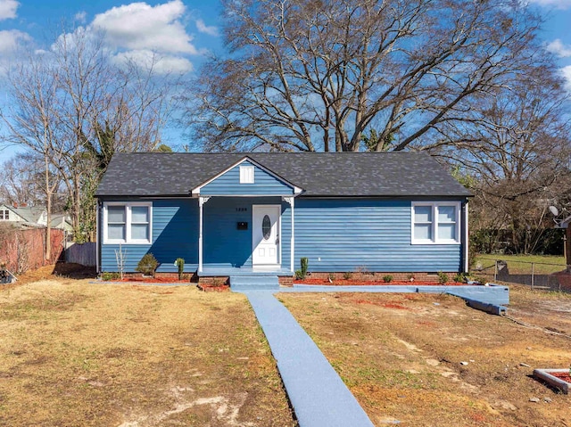 view of front of home with a front yard