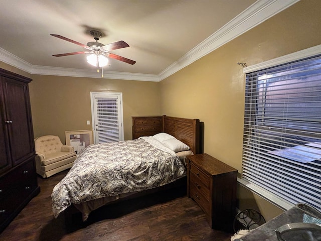 bedroom with ceiling fan, ornamental molding, and dark wood finished floors