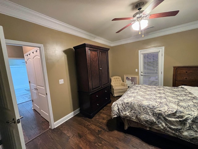 bedroom with dark wood-style floors and crown molding