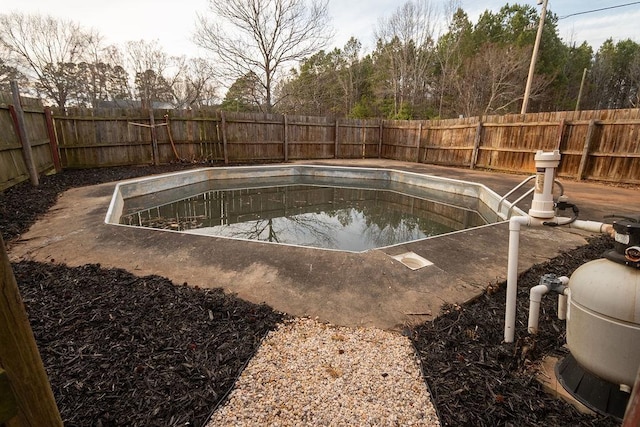 view of swimming pool featuring a fenced backyard and a fenced in pool