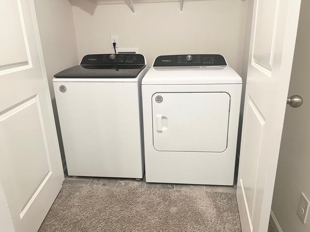 laundry area featuring laundry area and separate washer and dryer