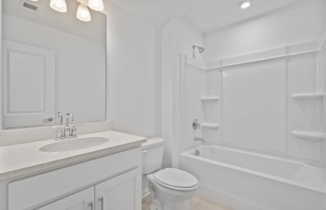 bathroom with washtub / shower combination, toilet, vanity, and visible vents