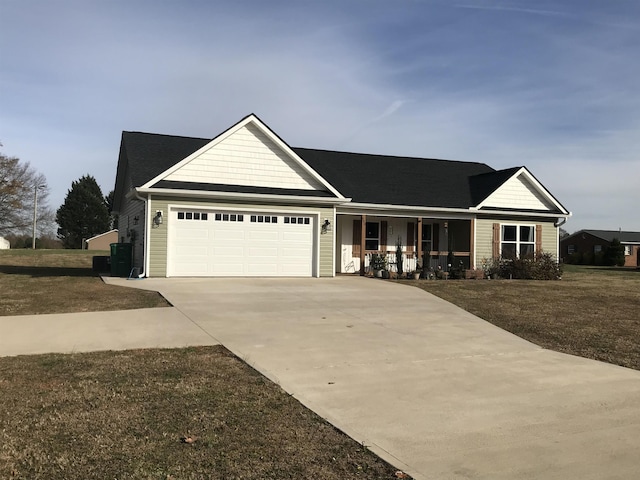 ranch-style house with a garage, driveway, a front lawn, and covered porch