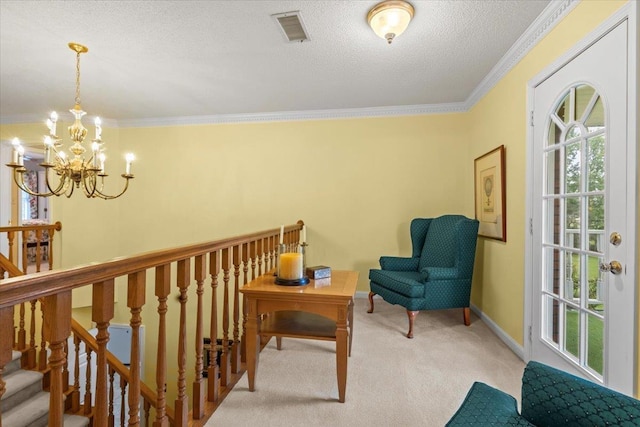 sitting room featuring baseboards, visible vents, light colored carpet, ornamental molding, and a textured ceiling