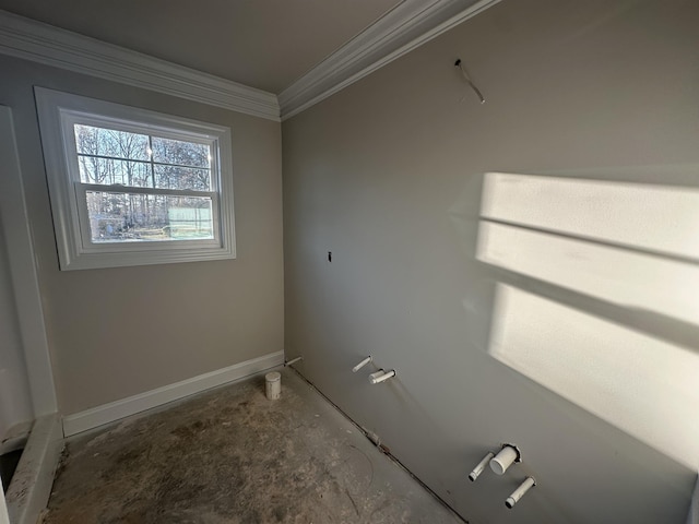 laundry room featuring ornamental molding and baseboards