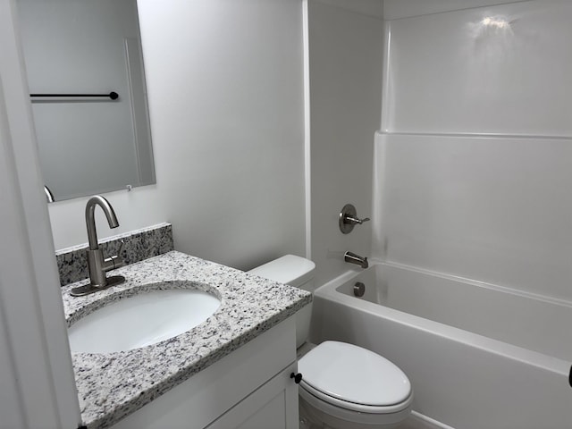 full bathroom with shower / bathing tub combination, vanity, and toilet