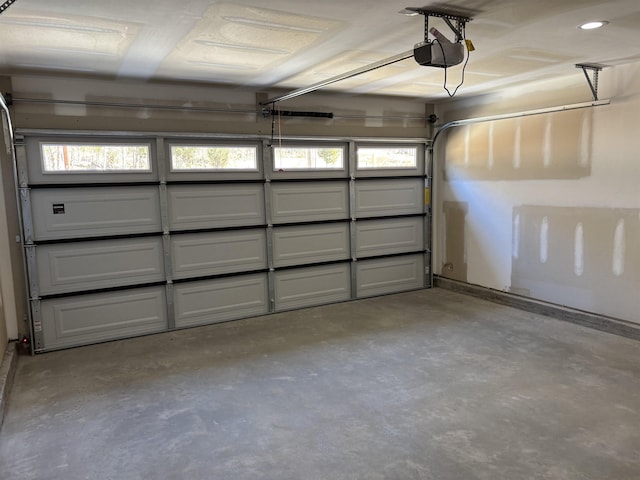 garage featuring a garage door opener