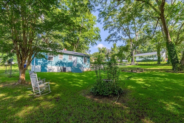 view of yard with fence