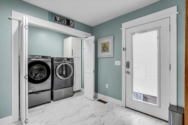 laundry area with laundry area, visible vents, baseboards, marble finish floor, and separate washer and dryer