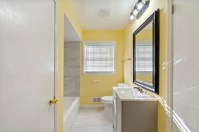 full bath with a bathtub, marble finish floor, visible vents, toilet, and vanity