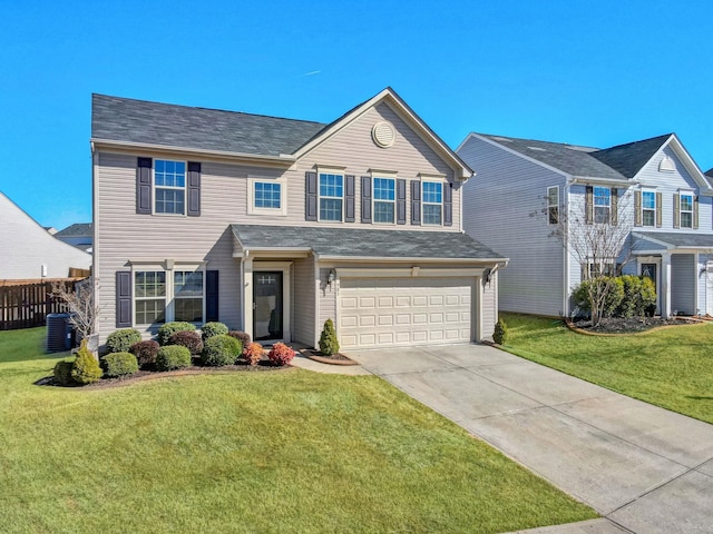 traditional-style house with an attached garage, cooling unit, a front lawn, and concrete driveway