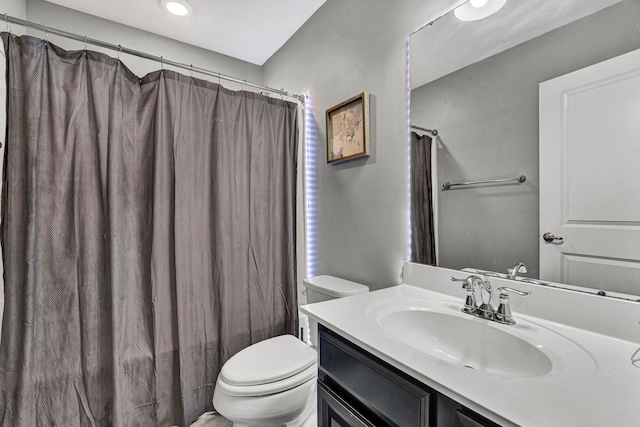 full bathroom with toilet, vanity, and shower / bathtub combination with curtain