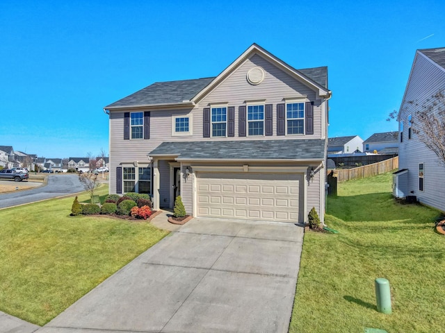 traditional-style house with a residential view, fence, concrete driveway, and a front yard