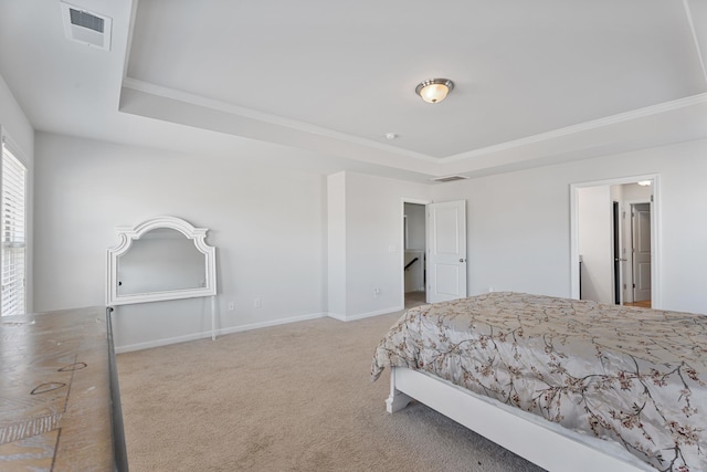 bedroom featuring light carpet, a tray ceiling, visible vents, and baseboards