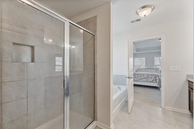 ensuite bathroom featuring ensuite bath, visible vents, and a shower stall