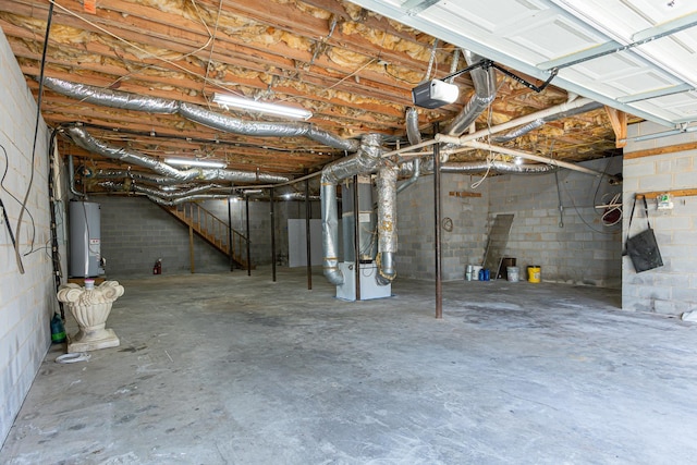 unfinished basement with water heater and heating unit