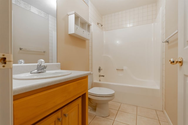 bathroom featuring washtub / shower combination, tile patterned flooring, vanity, and toilet