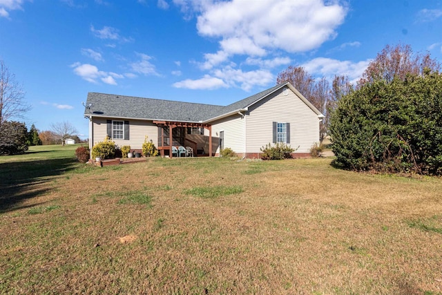 ranch-style house featuring a front lawn