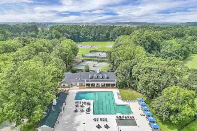 bird's eye view with a forest view