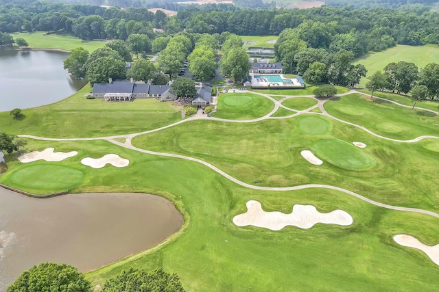 aerial view featuring golf course view and a water view