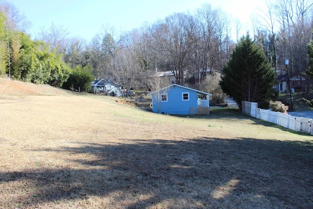 view of yard featuring fence