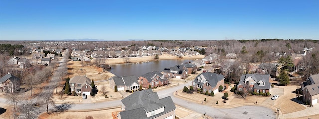 aerial view with a water view and a residential view