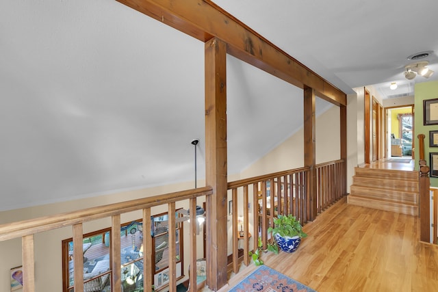 hall featuring visible vents and light wood-style flooring