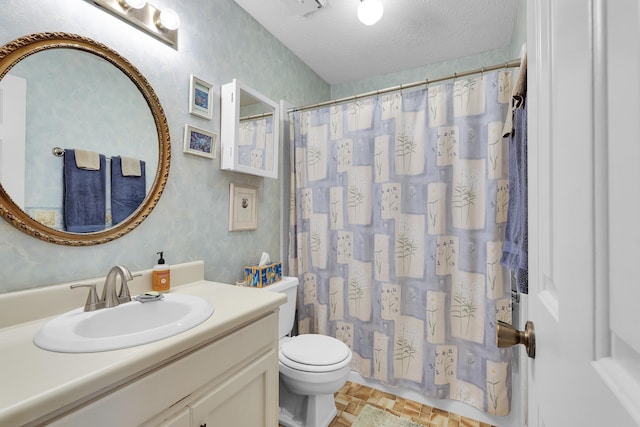 full bath featuring toilet, a shower with curtain, a textured ceiling, and vanity