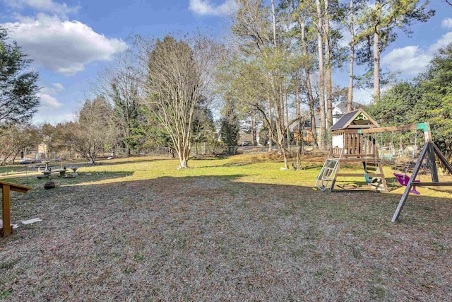 view of yard featuring playground community