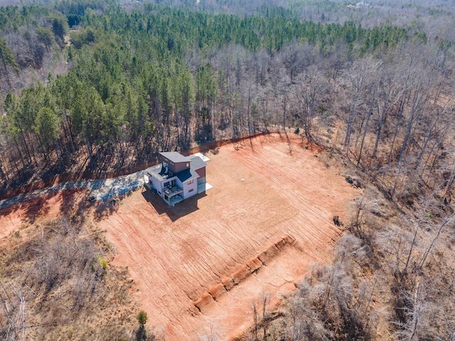 drone / aerial view with a view of trees