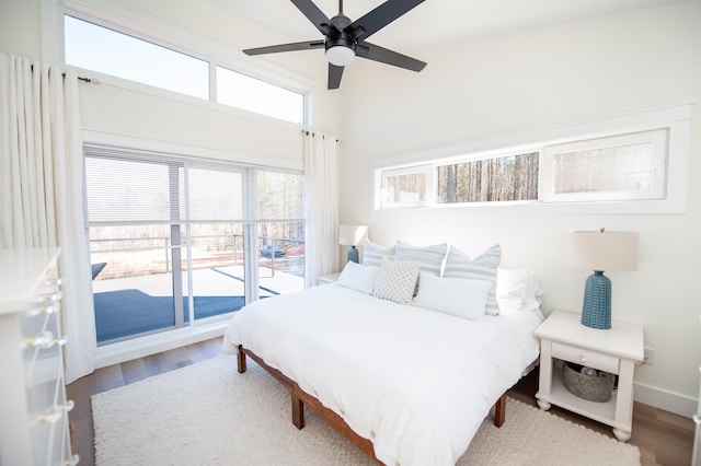 bedroom featuring a ceiling fan, baseboards, and light wood finished floors