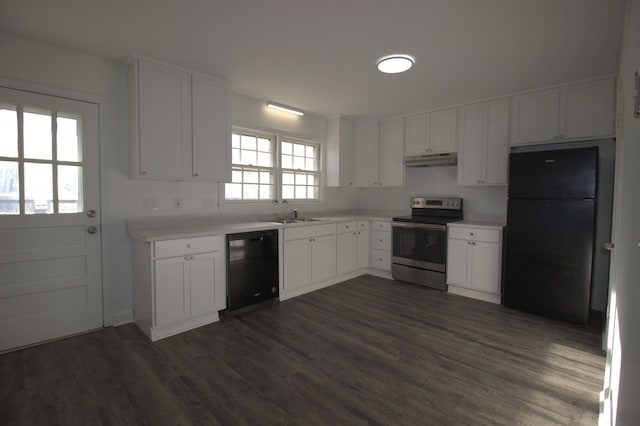 kitchen featuring under cabinet range hood, white cabinets, light countertops, black appliances, and dark wood finished floors