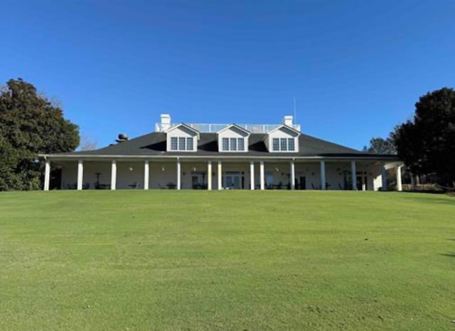 view of front of home with a front yard