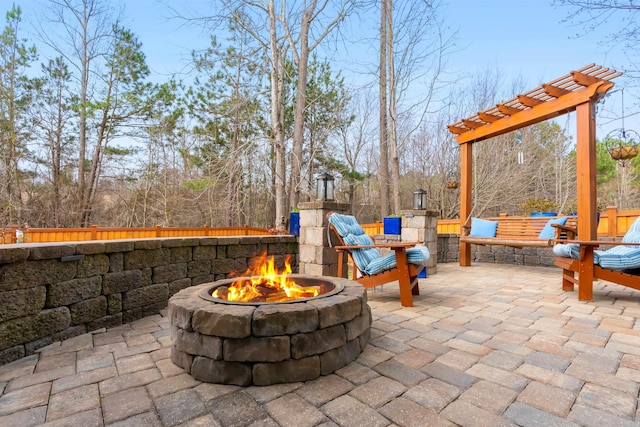 view of patio featuring a fire pit