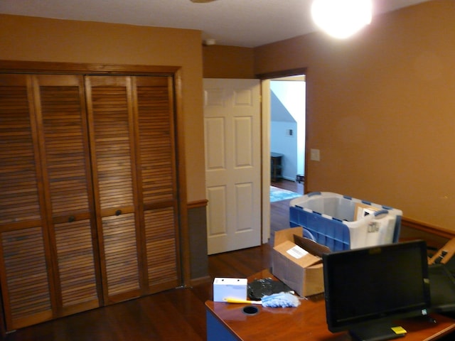 office with dark wood-style flooring