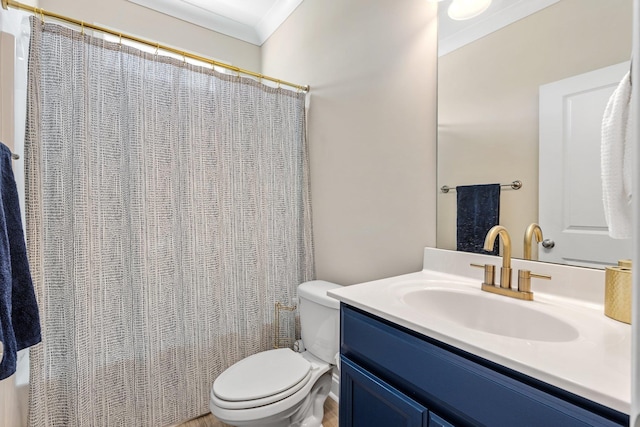 bathroom featuring toilet, a shower with shower curtain, crown molding, and vanity