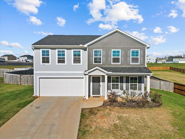 traditional home with concrete driveway, board and batten siding, fence, a garage, and a front lawn