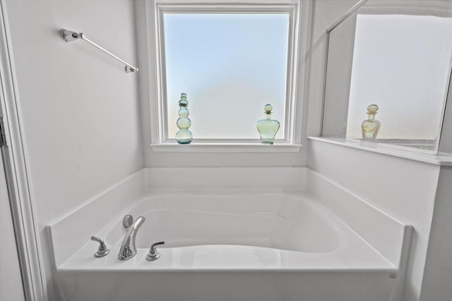 bathroom featuring a garden tub