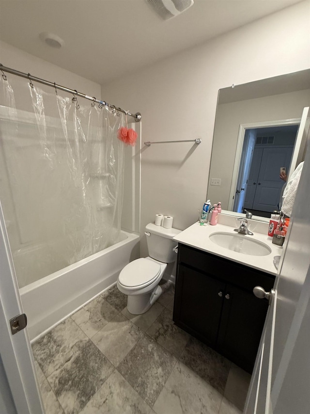 full bathroom with visible vents, shower / tub combo, vanity, and toilet