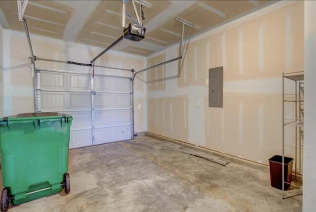 garage featuring a garage door opener and electric panel