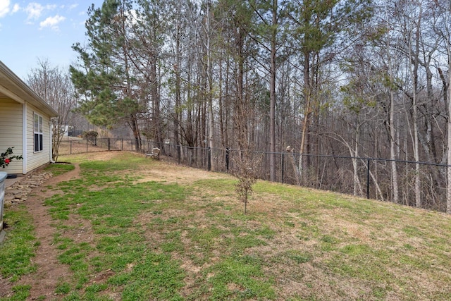 view of yard with fence